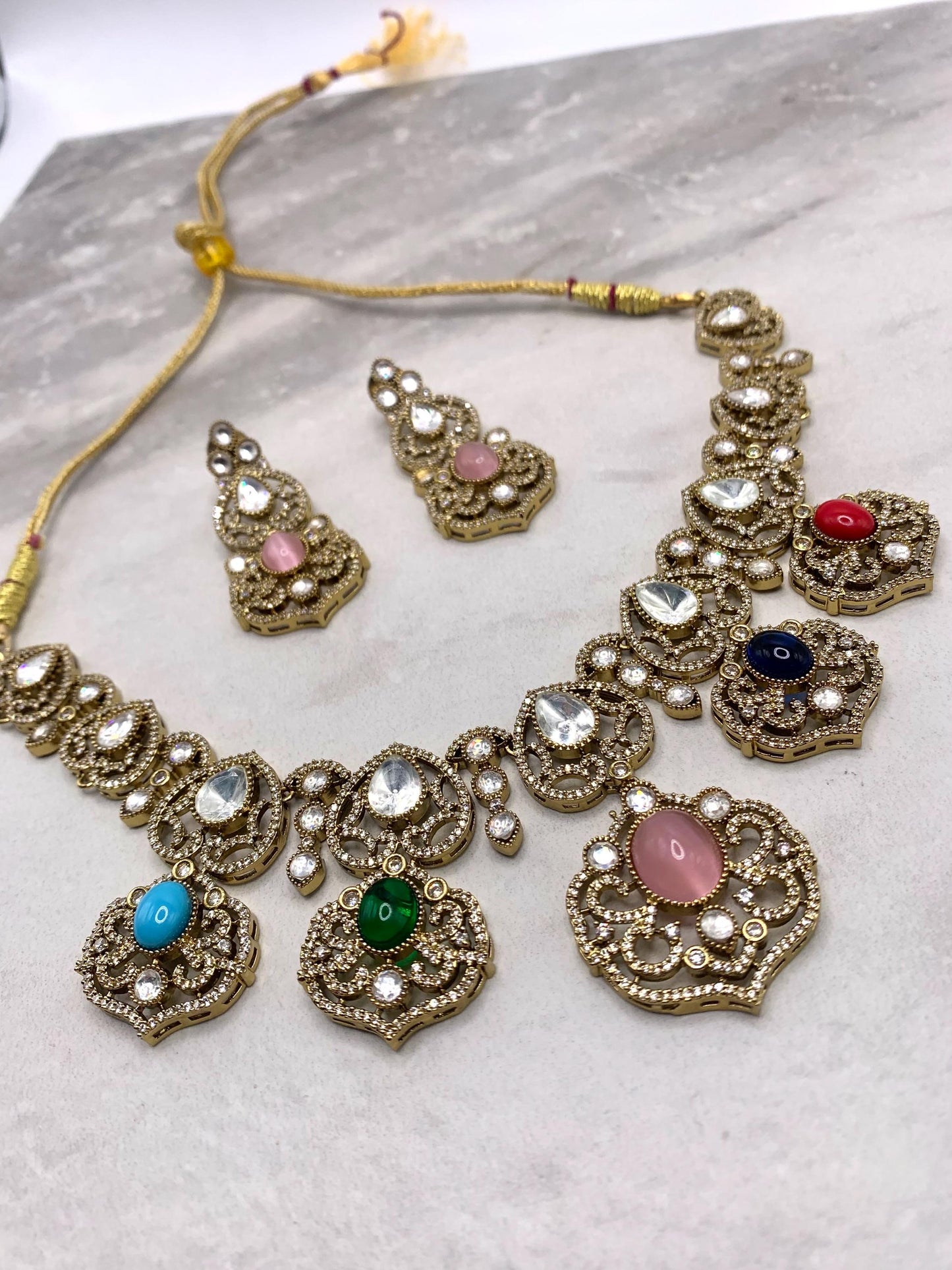 Sabyasachi inspired necklace studded with semi precious stone and moissanite polki and earrings