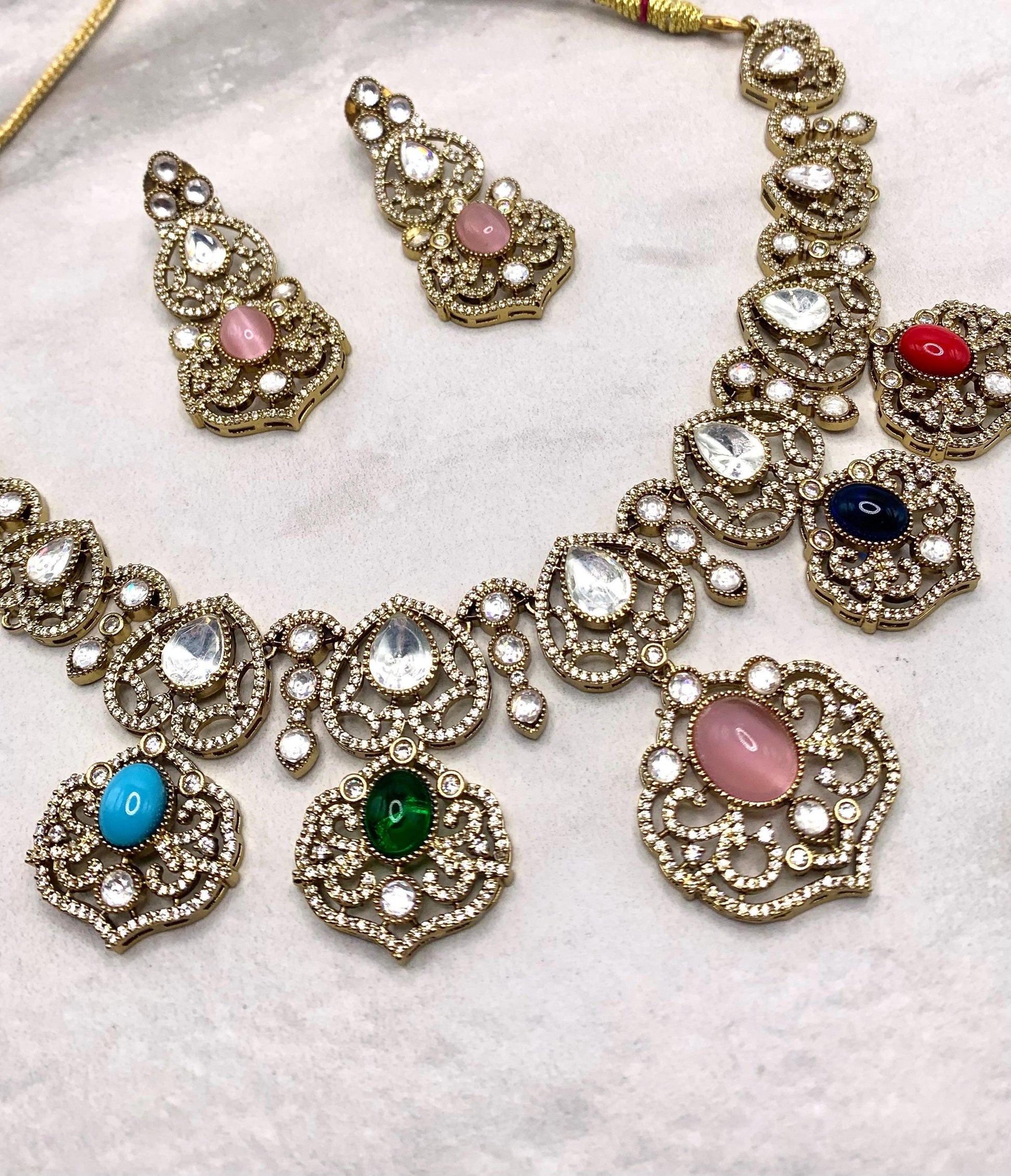 Sabyasachi inspired necklace studded with semi precious stone and moissanite polki and earrings