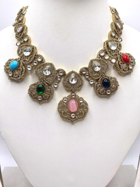 Sabyasachi inspired necklace studded with semi precious stone and moissanite polki and earrings